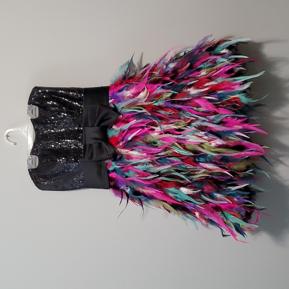 Jovani size 6 sleeveless dress with feather skirt